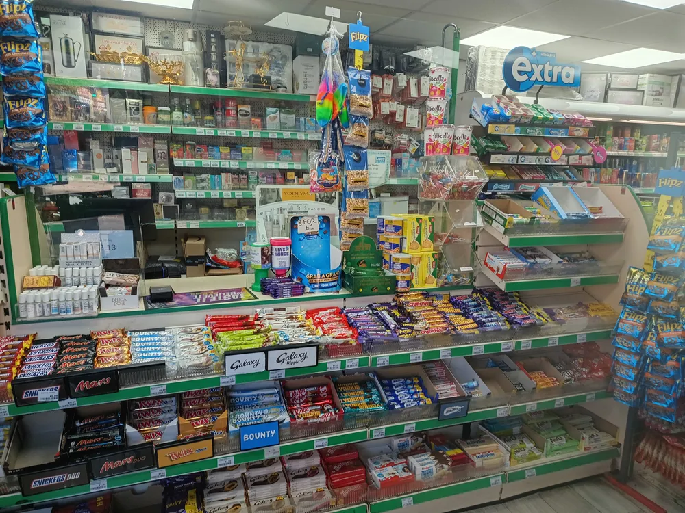 Chocolate, sweets and everyday goods at the Paradise Mini Market counter