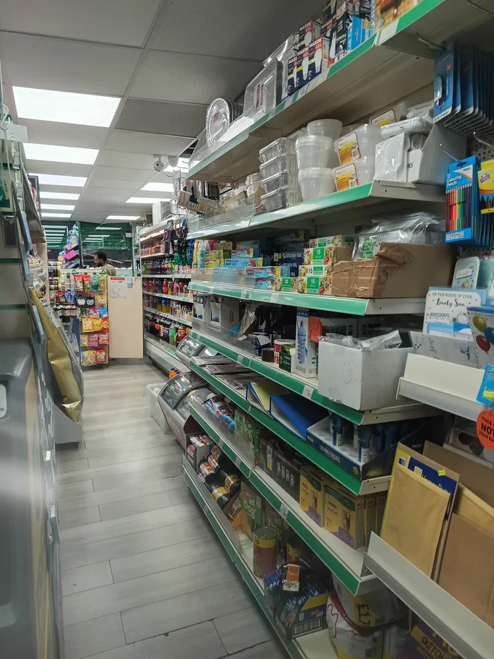 An aisle of household and kitchen essentials in the shop