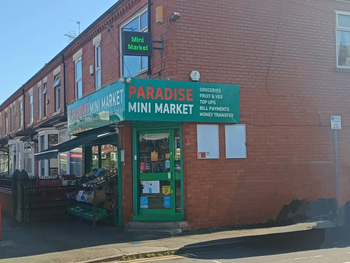 Paradise Mini Market's green shopfront on Great Western Street